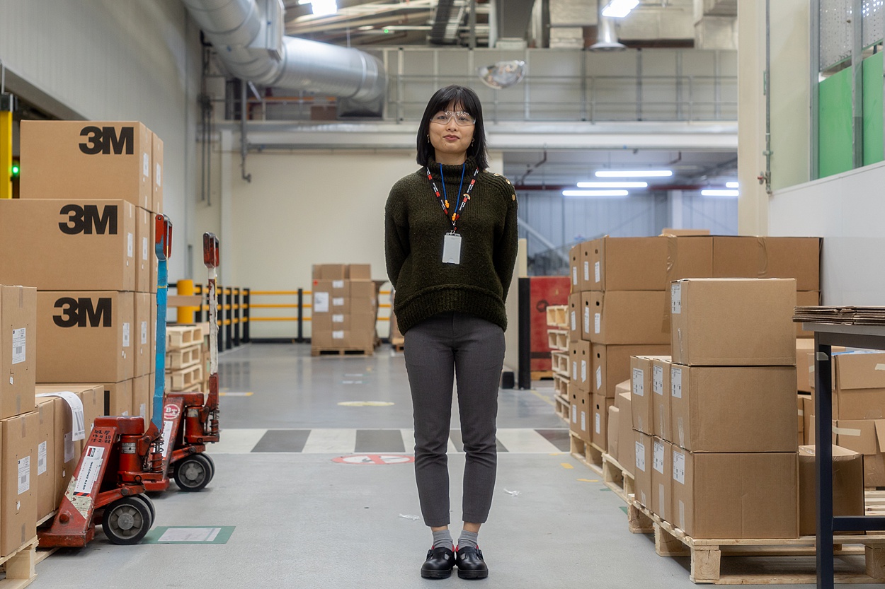 employee in factory for on location headshots of business